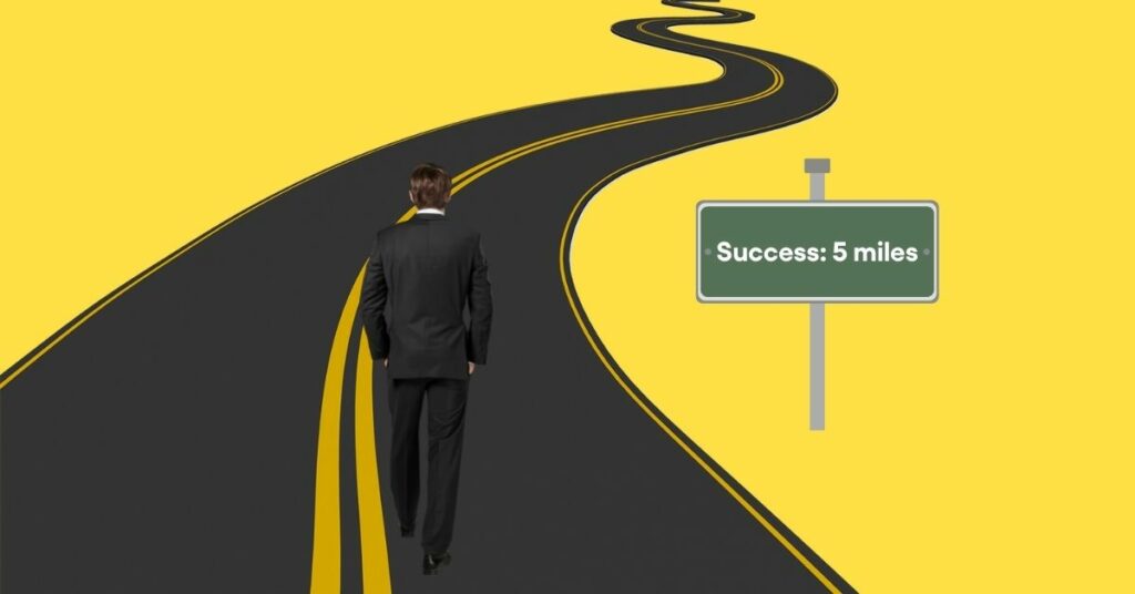 businessman walking on the road to success
