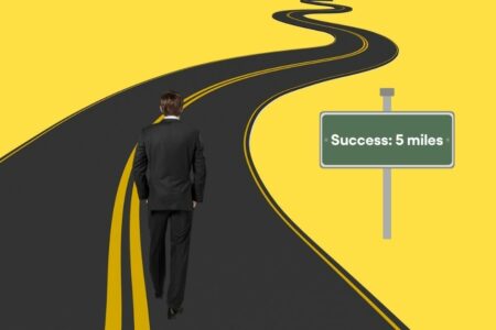 businessman walking on the road to success